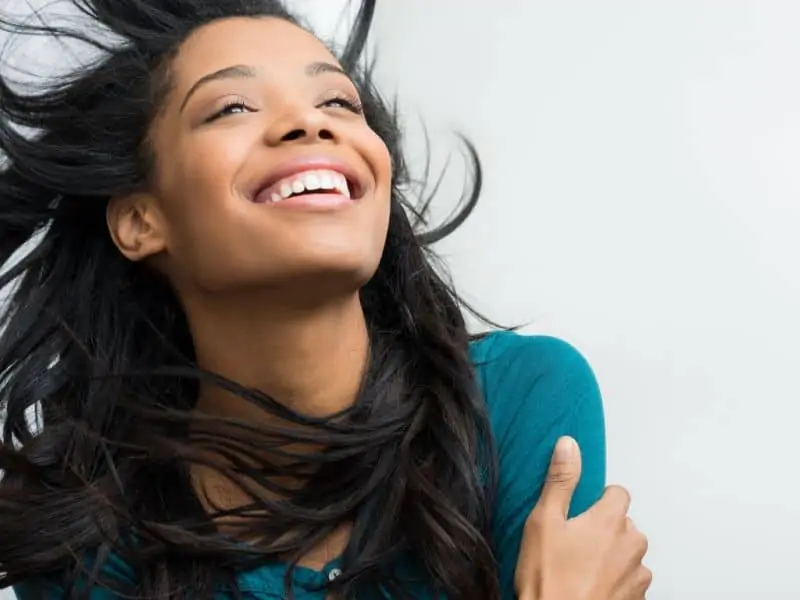 smiling girl with relaxed hair