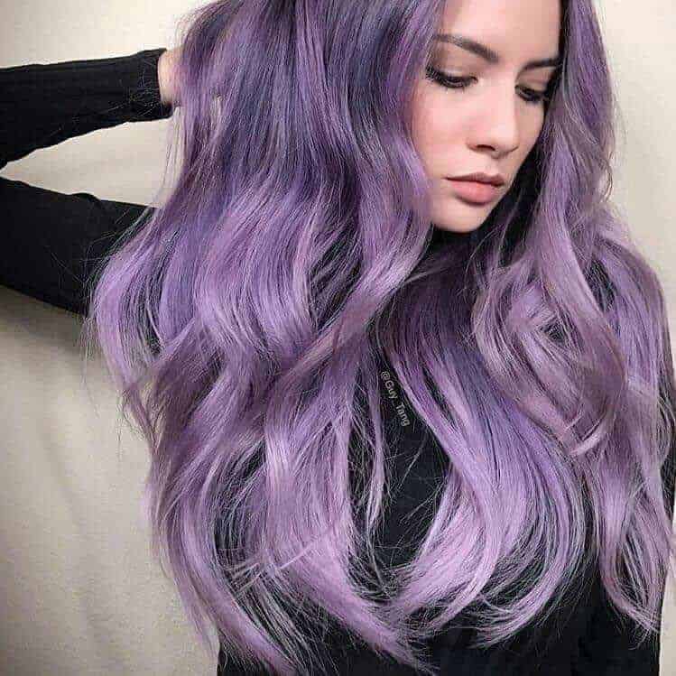 elegant woman with pastel purple hair