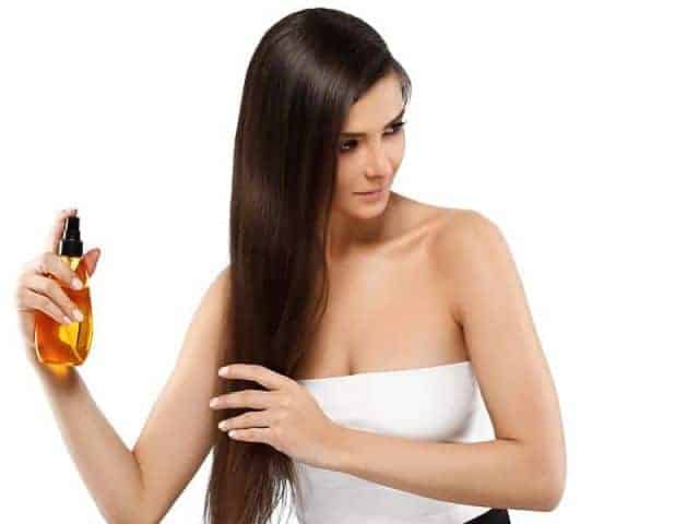 applying oil to keratin-treated hair 