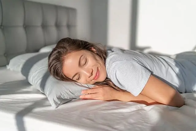 girl sleeping on a bamboo pillowcase