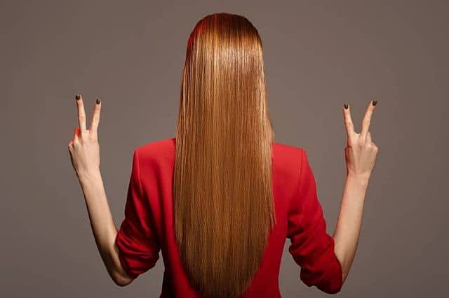 A woman with long hair and perfect color results