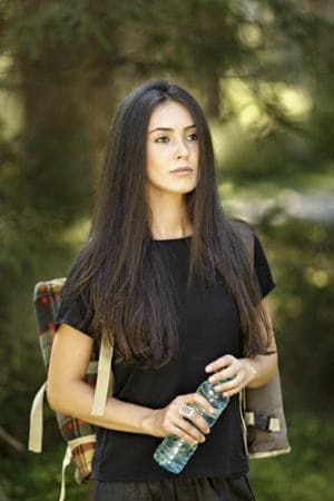 Active beautiful woman with long dark hair