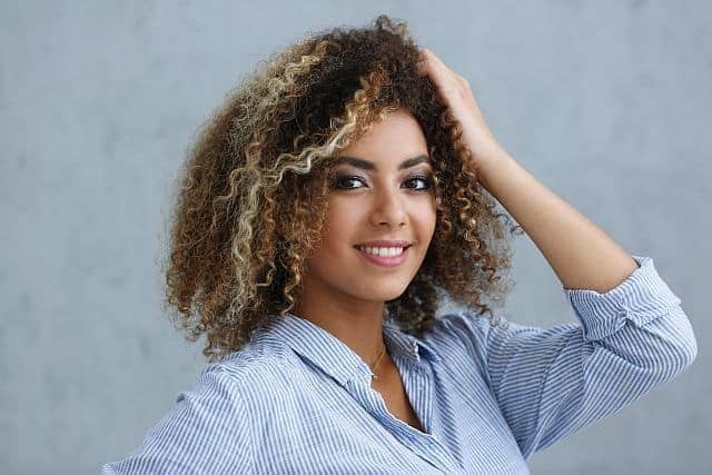 Attractive African-American girl with healthy curly hair