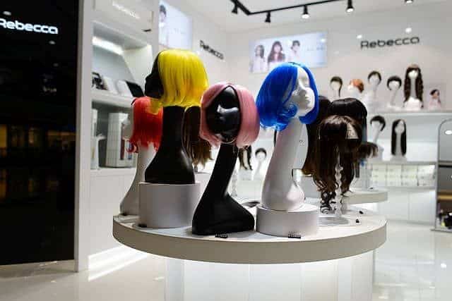 Wigs on wig heads and stands