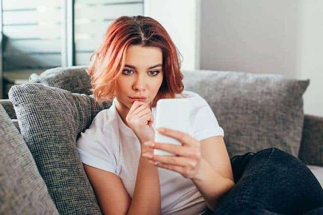 a girl searching for information on her phone