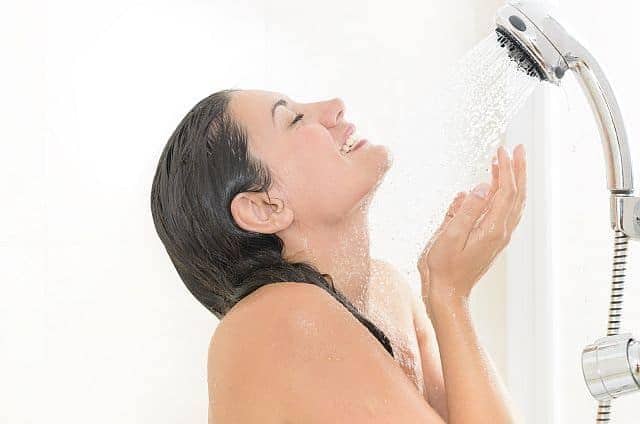 a young woman in the shower