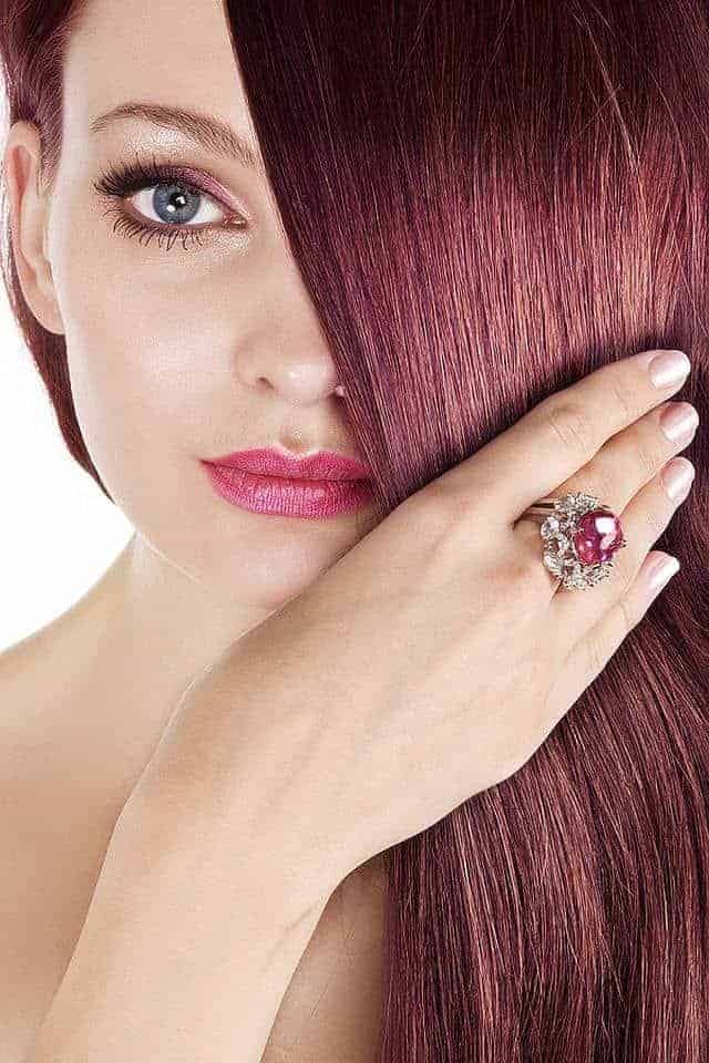 attractive woman with ruby hair color