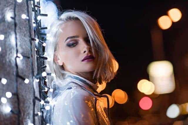 fashion blonde girl surrounded by lights