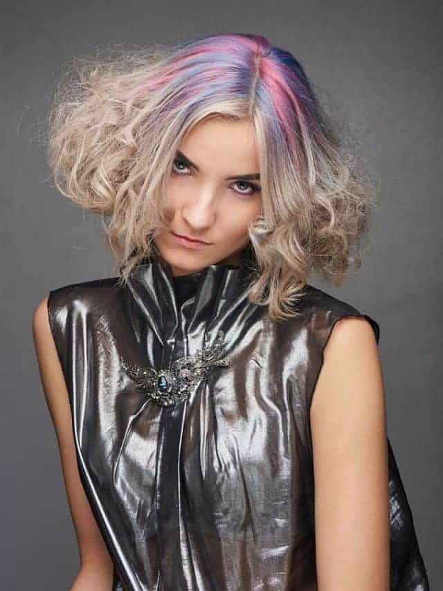 Fashion girl with hair color wax in the hair
