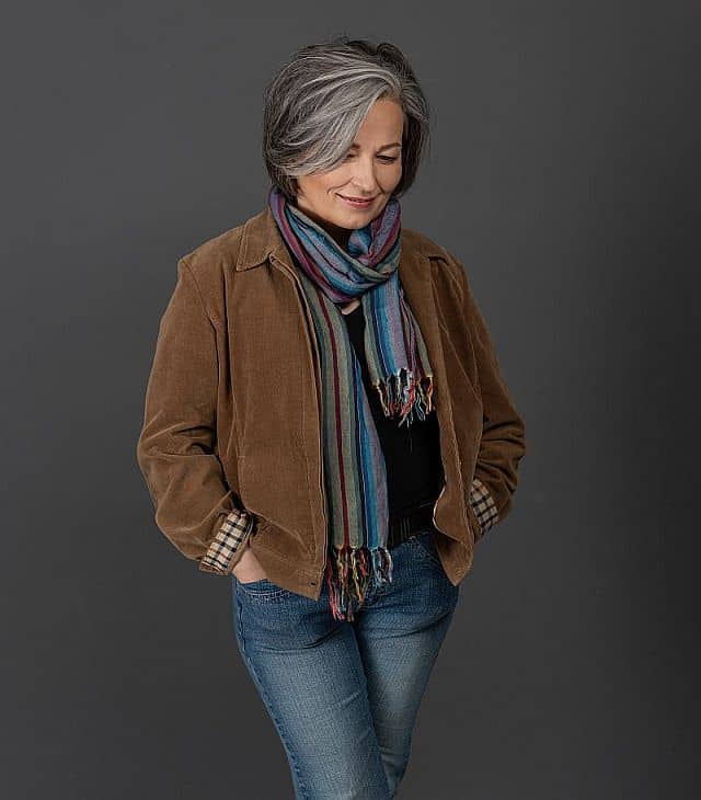 smiling gray haired woman in casual clothes