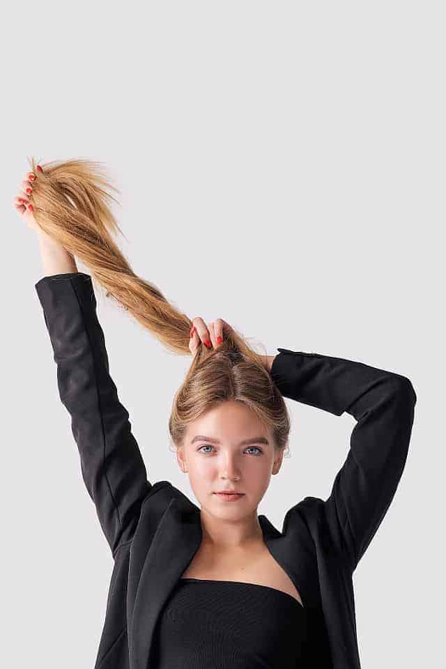  A girl holding her long hair