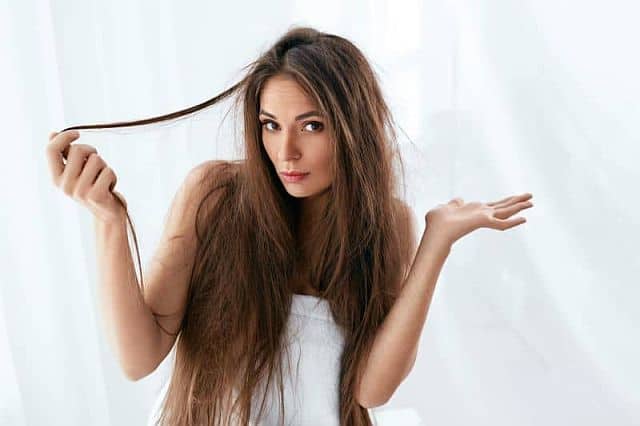 A woman with dry hair-that-needs-Botox-hair-treatment