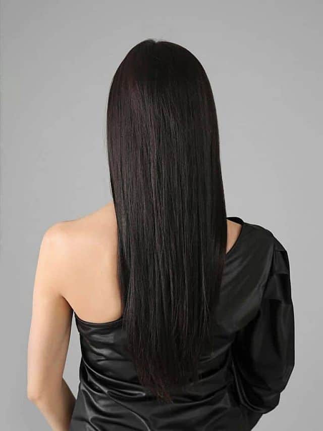 A woman with keratin straightened hair backside