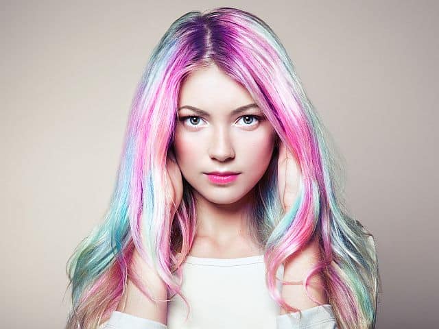 a girl with beautiful rainbow hair