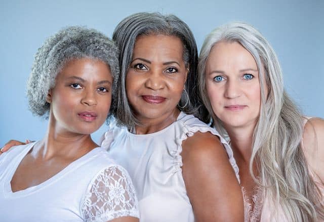 three women with graying hair
