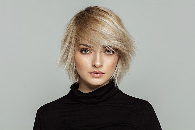 beautiful blonde woman with short wispy hair