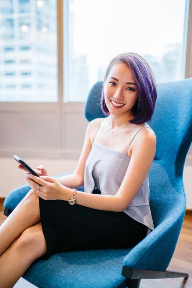 Asian woman with purple colored hair