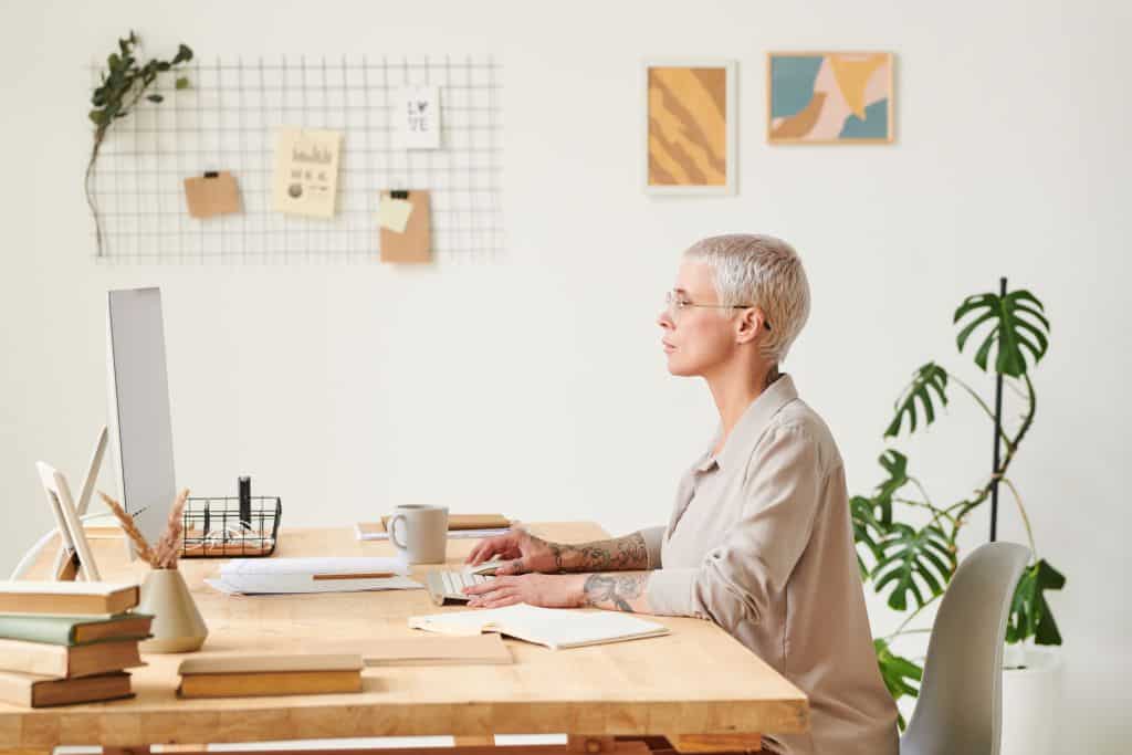 Focused middleaged business lady with white hair