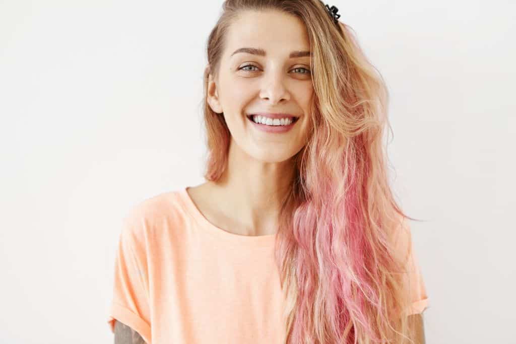 smiling girl after using color remover for semi-permanent dyes