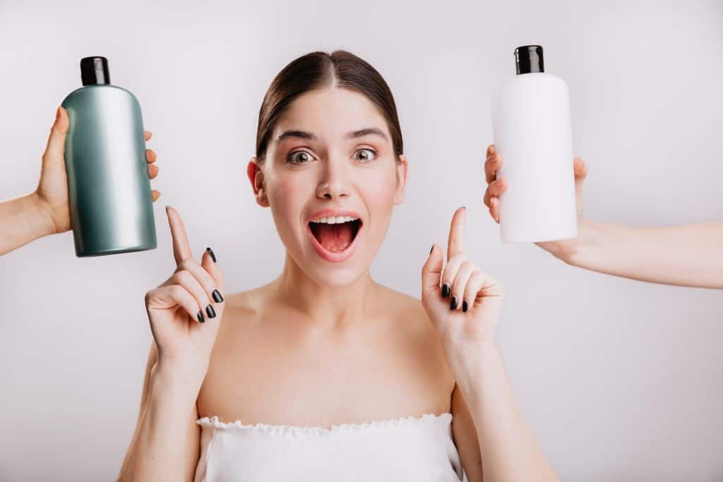 a woman choosing to use or not to use shampoo