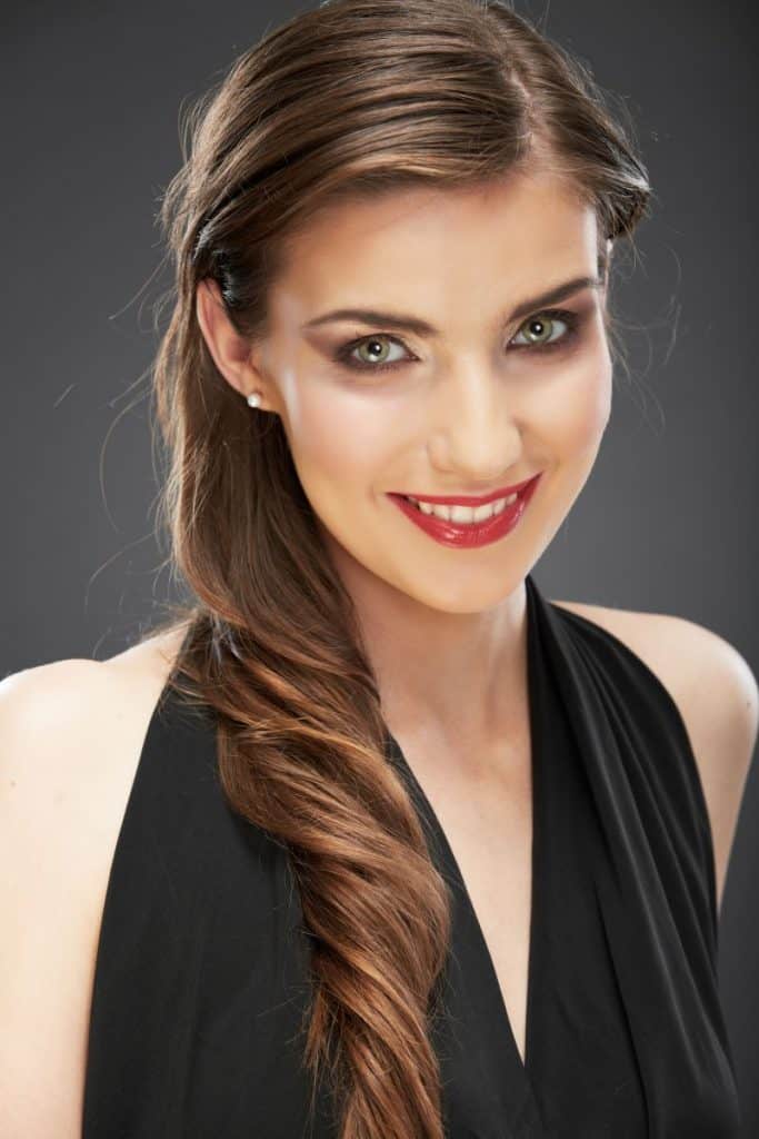 Beauty smiling woman with lowlights in brown hair
