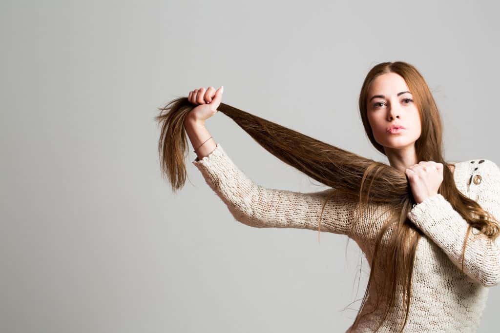 Pretty girl with long and strong hair