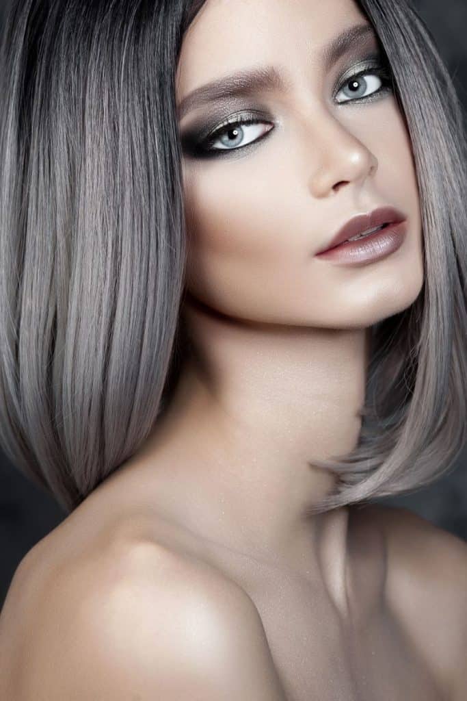 Young beautiful girl with dark silver hair