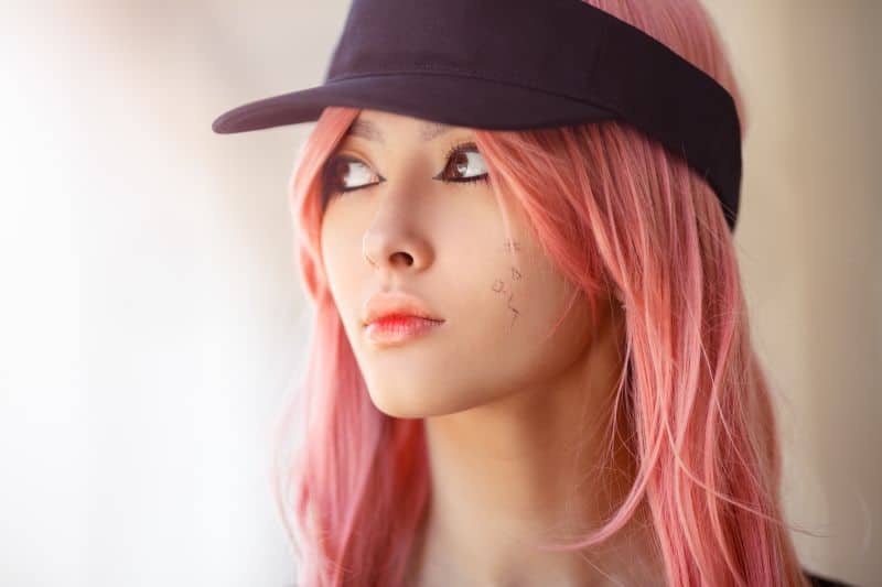 Fashion Asian girl wearing pink wig