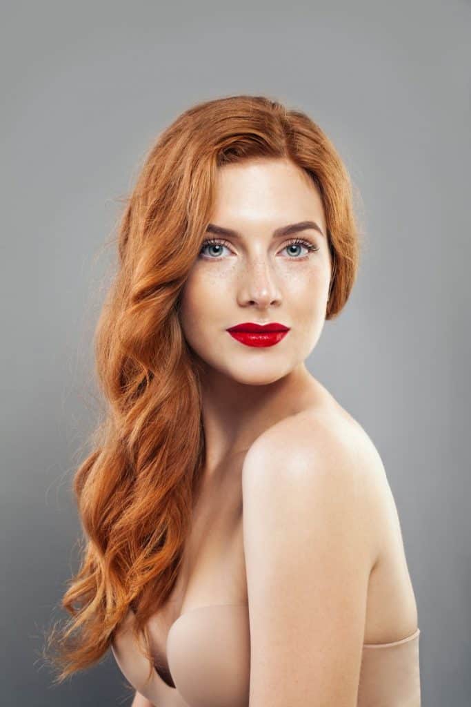 Tender redhead girl with healthy hair