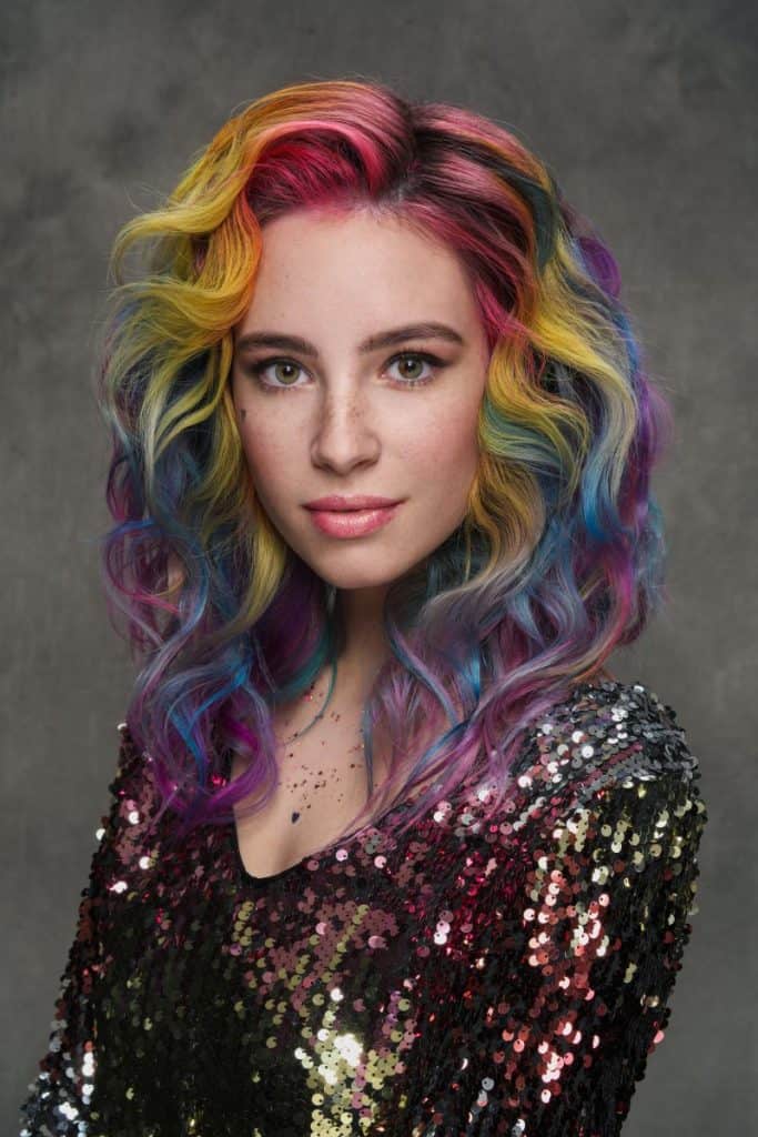 a young woman with multicolored hair
