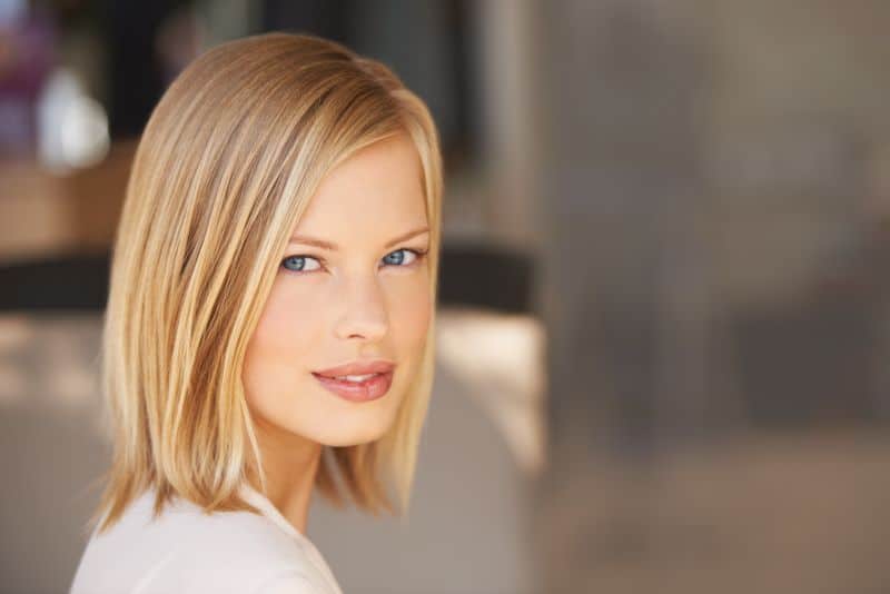 A gorgeous young woman with processed blonde hair