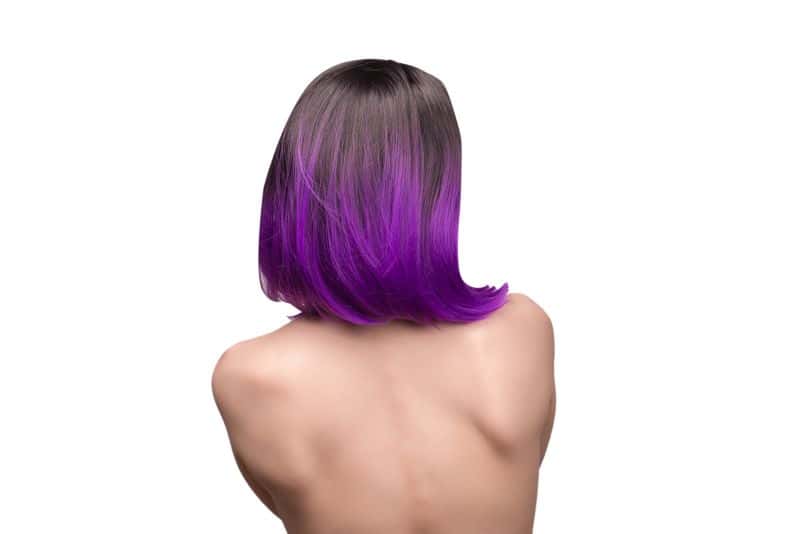 backside of  woman with purple ombre hair 