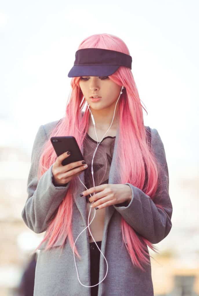 fashion asian girl with synthetic hair outdoors