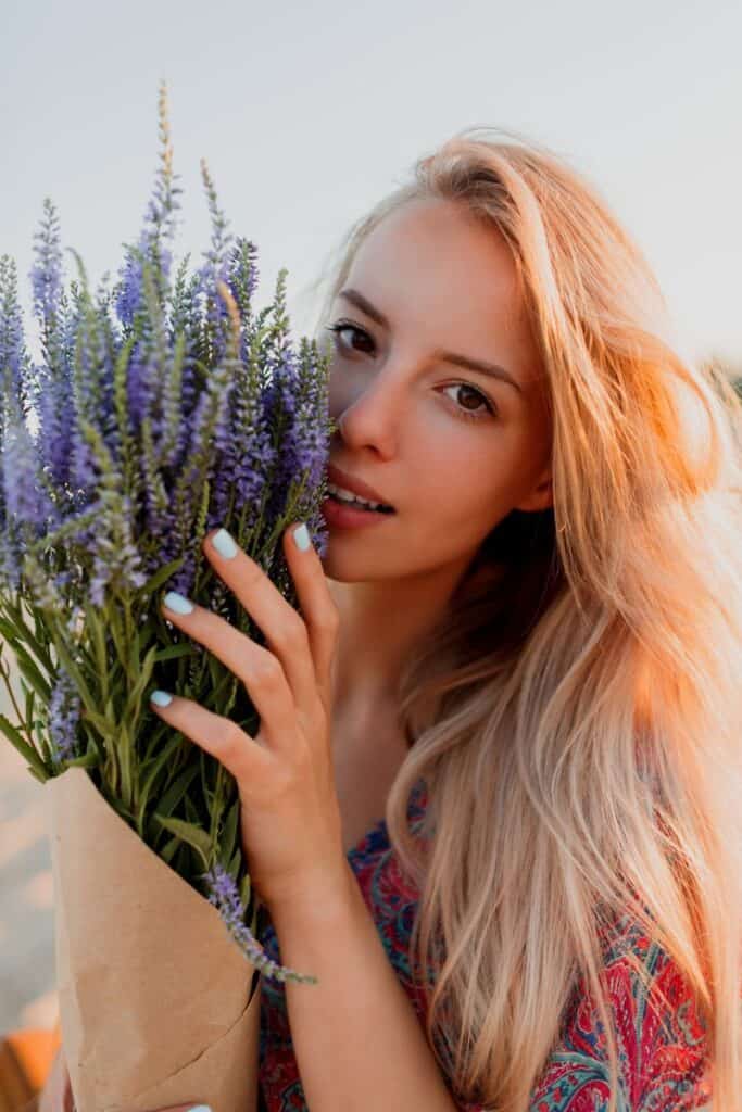lovely blond woman with bouquet of lavender