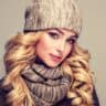 Blonde woman in a wool winter cap